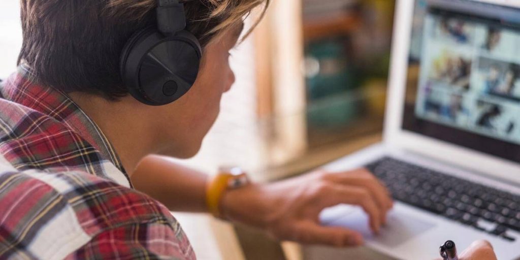 worker with headphones listening to focus music