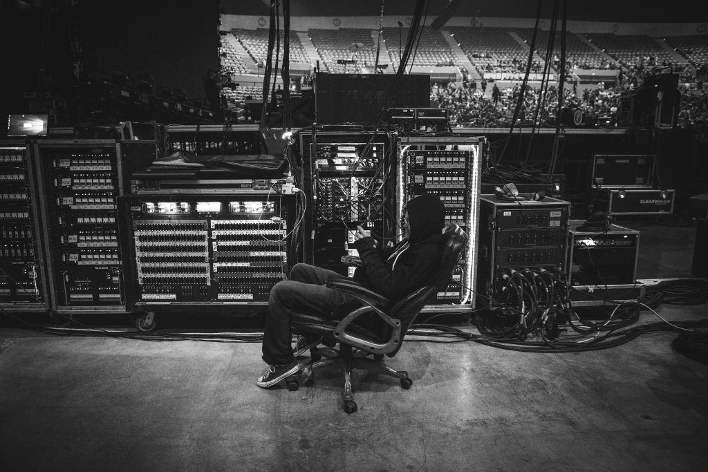 A Cover Image For a Blog Titled: The Impact of Technology on the Music Industry: Streaming, Social Media & More.