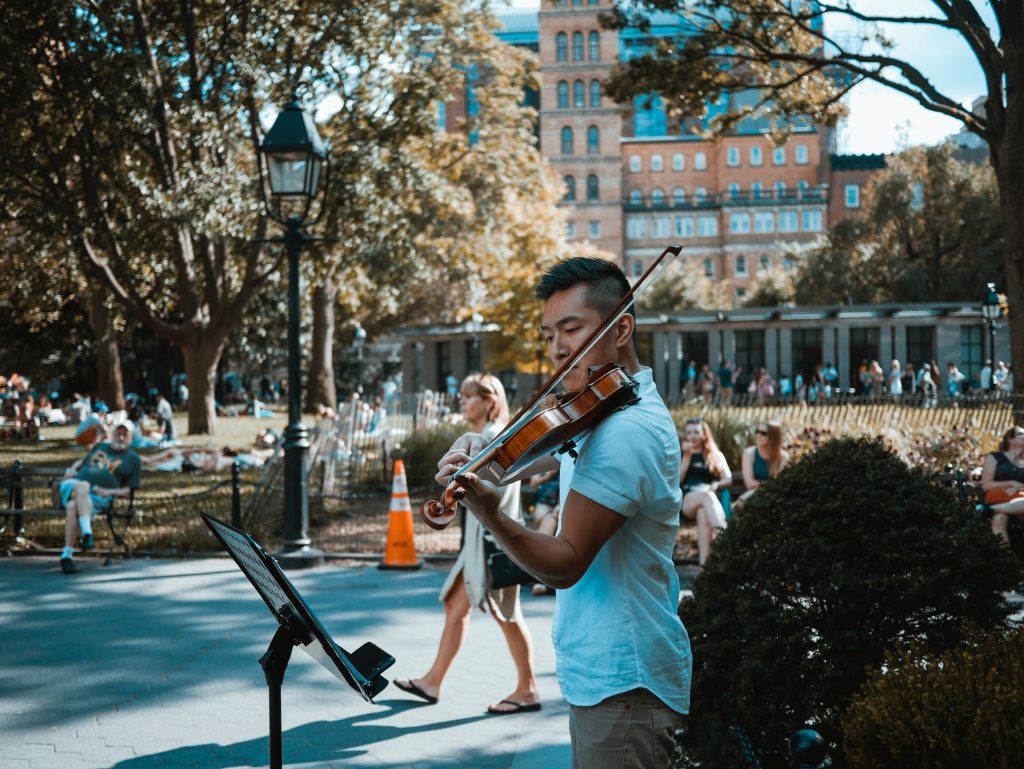 Music in public spaces has a magnetic pull, drawing people together and adding an extra layer of richness to urban life.